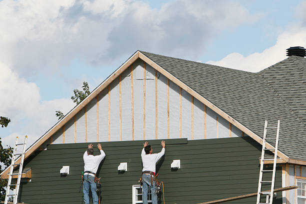 Professional Siding technician working in McAdenville, NC